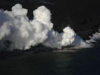 The lava flowing into the ocean